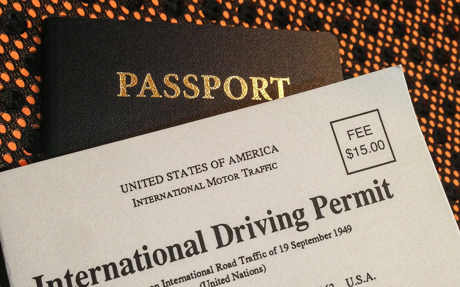 An International Driving Permit resting on top of a passport